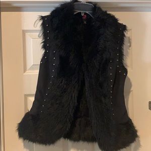 Black Bebe faux fur sleeveless jacket